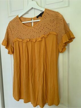 Mustard colored t-shirt blouse